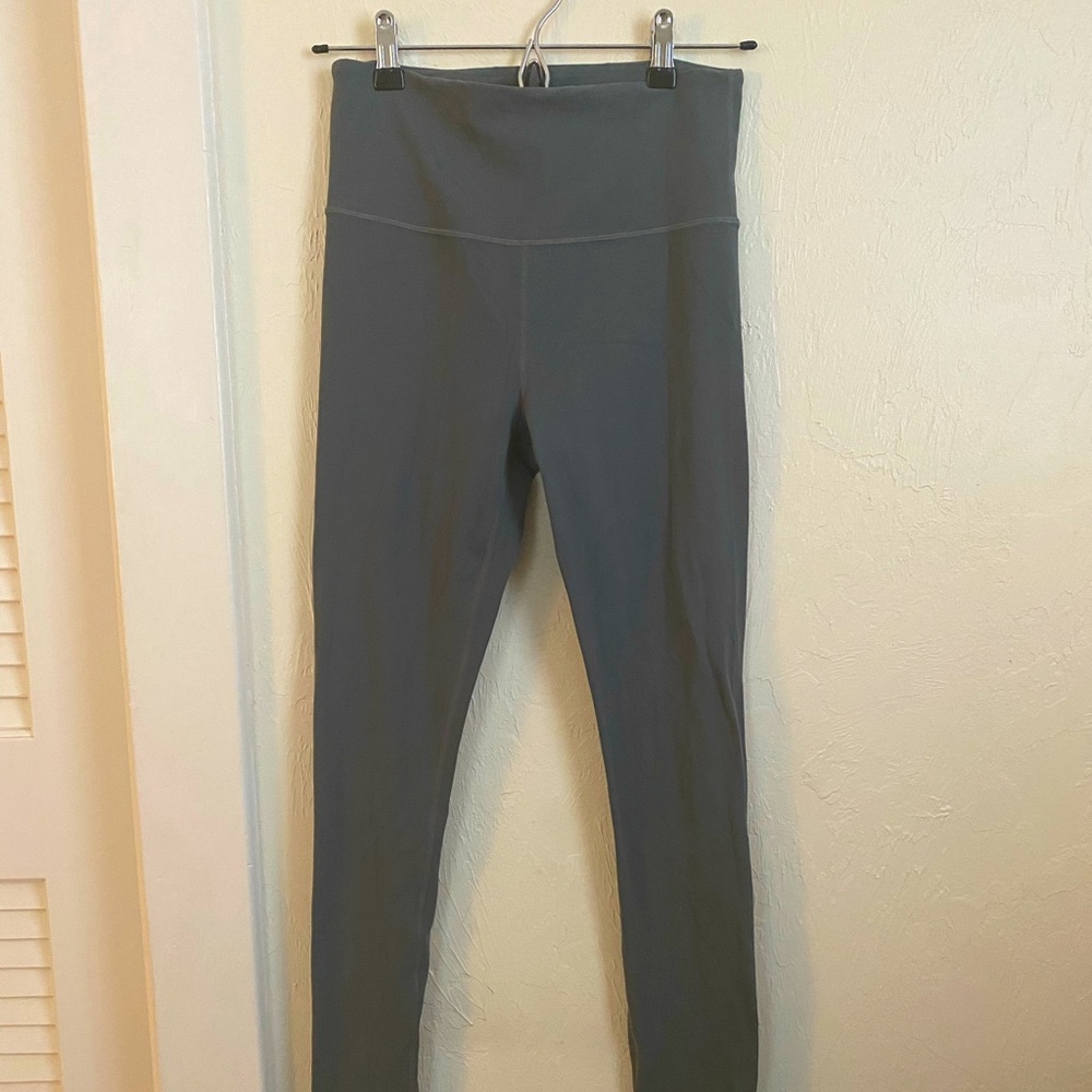 Athleta Ultra High Rise elevation tight, green/grey color. Small/Tall.